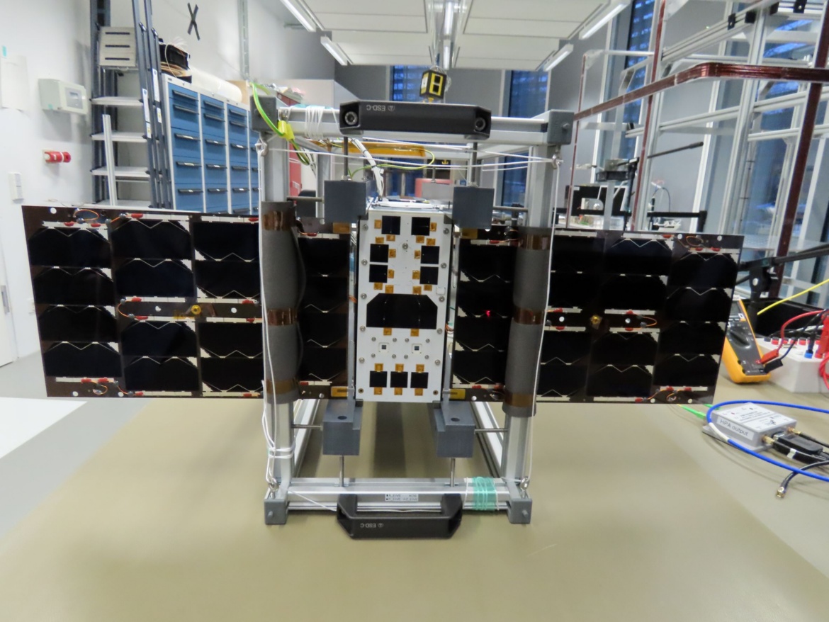 Picture of the integrated EIVE CubeSat in the integration cage 